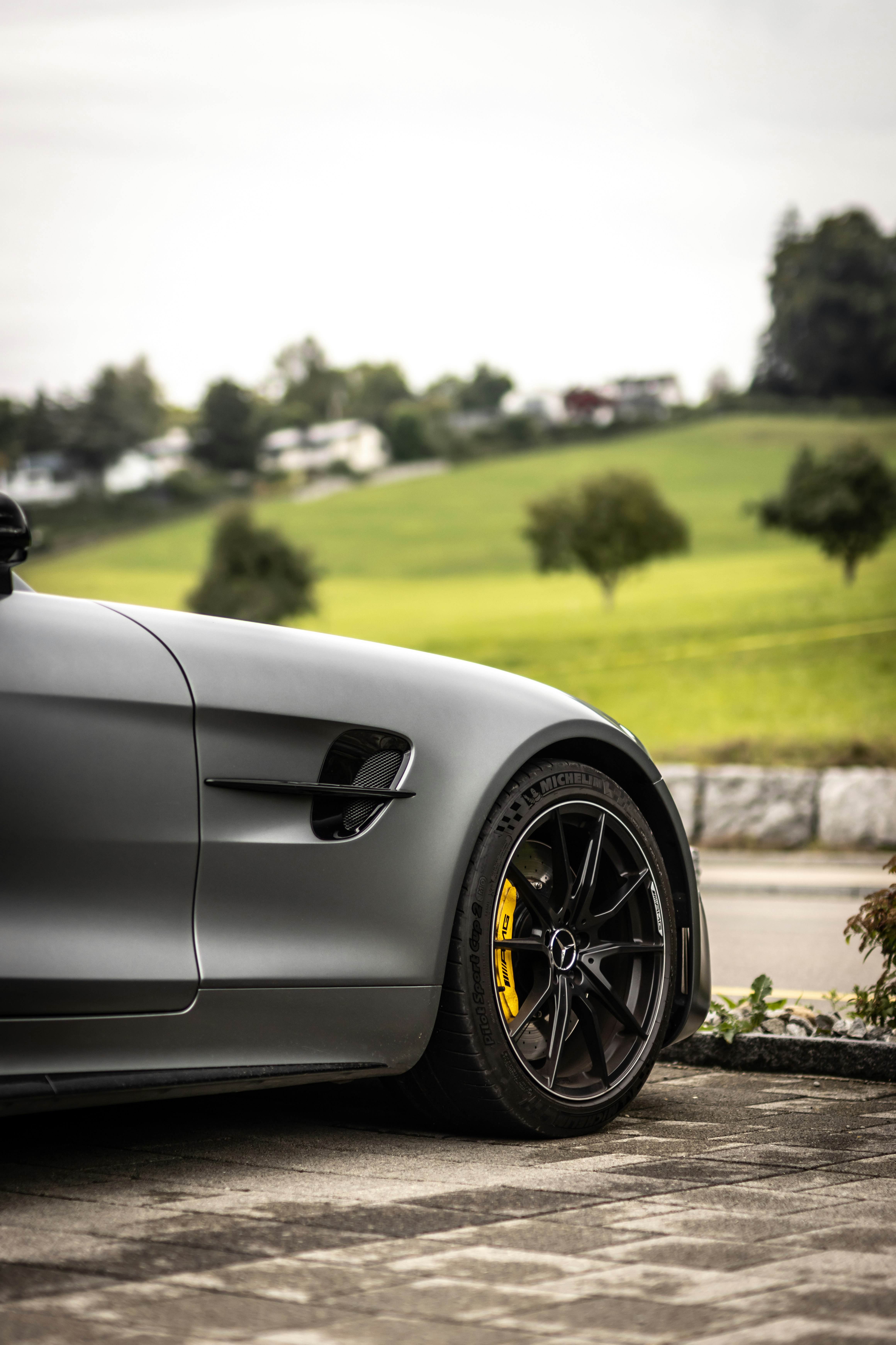 grey car on road during daytime